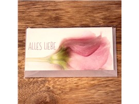 Eine kleine Grußkarte mit Schriftzug und Blumenmotiv im Gartencenter Graz - Gartenplanung Steiermark